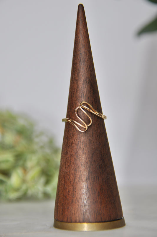 Freeform shaped ring with overlapping curves in 14kt yellow gold, size 6.5