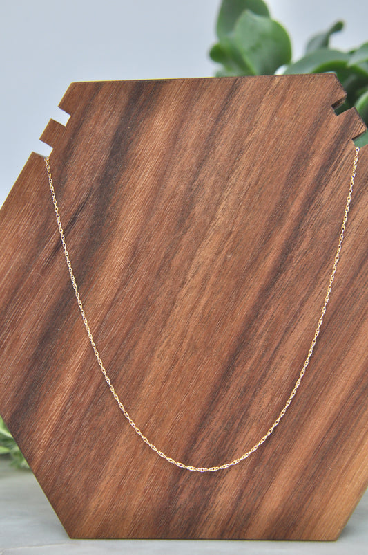 Rope chain necklace in 14kt yellow gold, .75mm thick, 18 inches long, with spring ring clasp