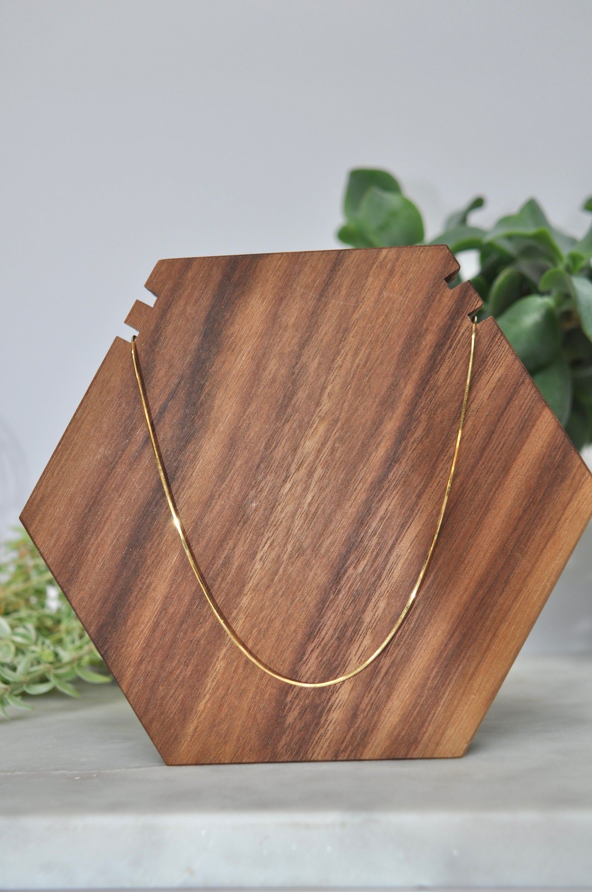 Snake chain in 14kt yellow gold, 1mm thick, 20 inches long, with lobster clasp