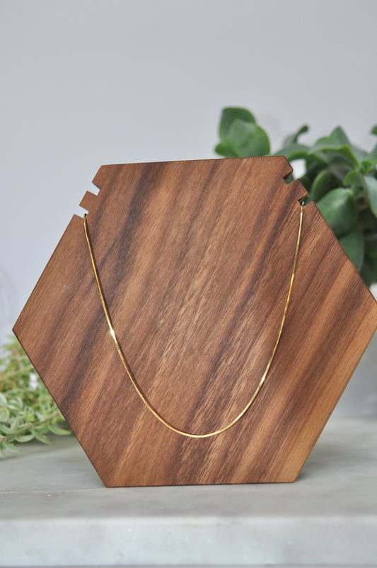 Snake chain in 14kt yellow gold, 1mm thick, 20 inches long, with lobster clasp