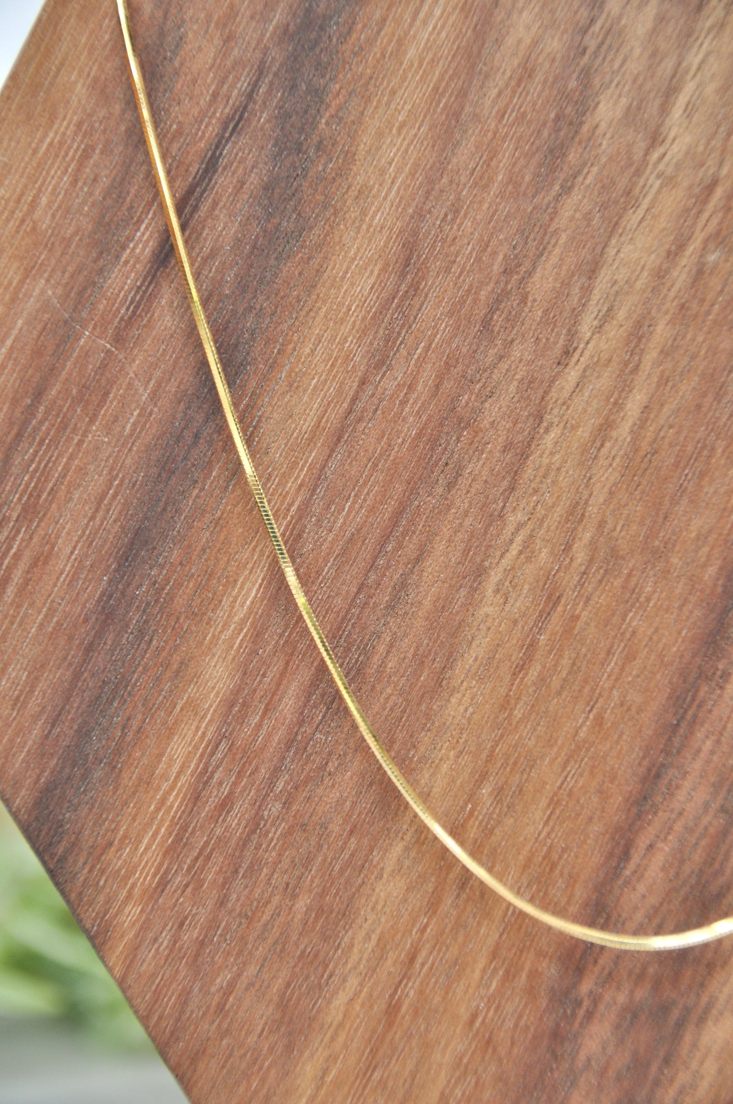 Snake chain in 14kt yellow gold, 1mm thick, 20 inches long, with lobster clasp
