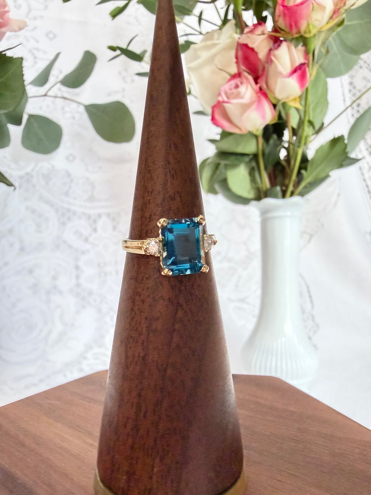 Emerald Cut Blue Topaz and Diamond Ring