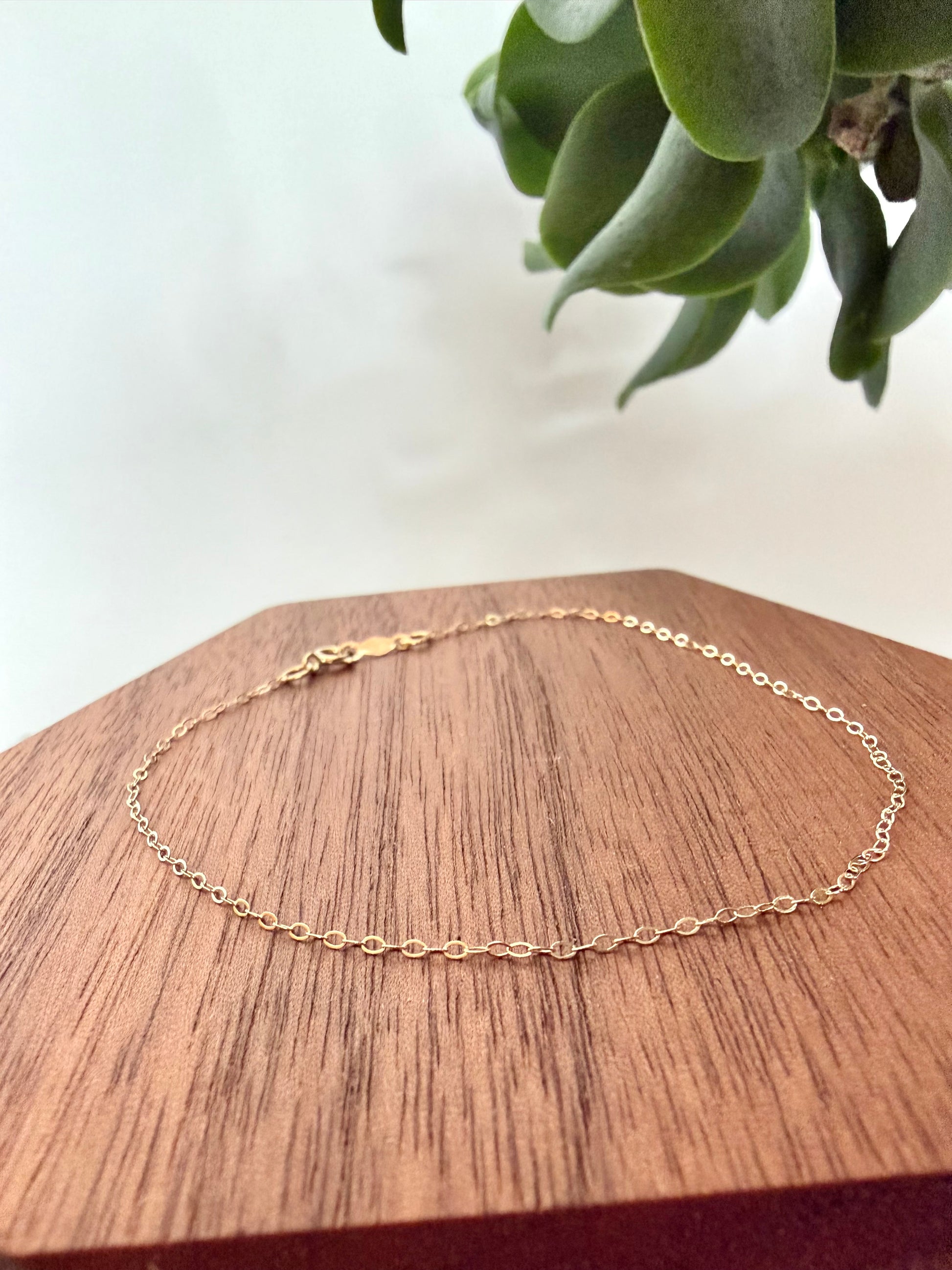Flat cable chain 14kt yellow gold bracelet, 1mm thick, 7 inches long, with spring ring clasp