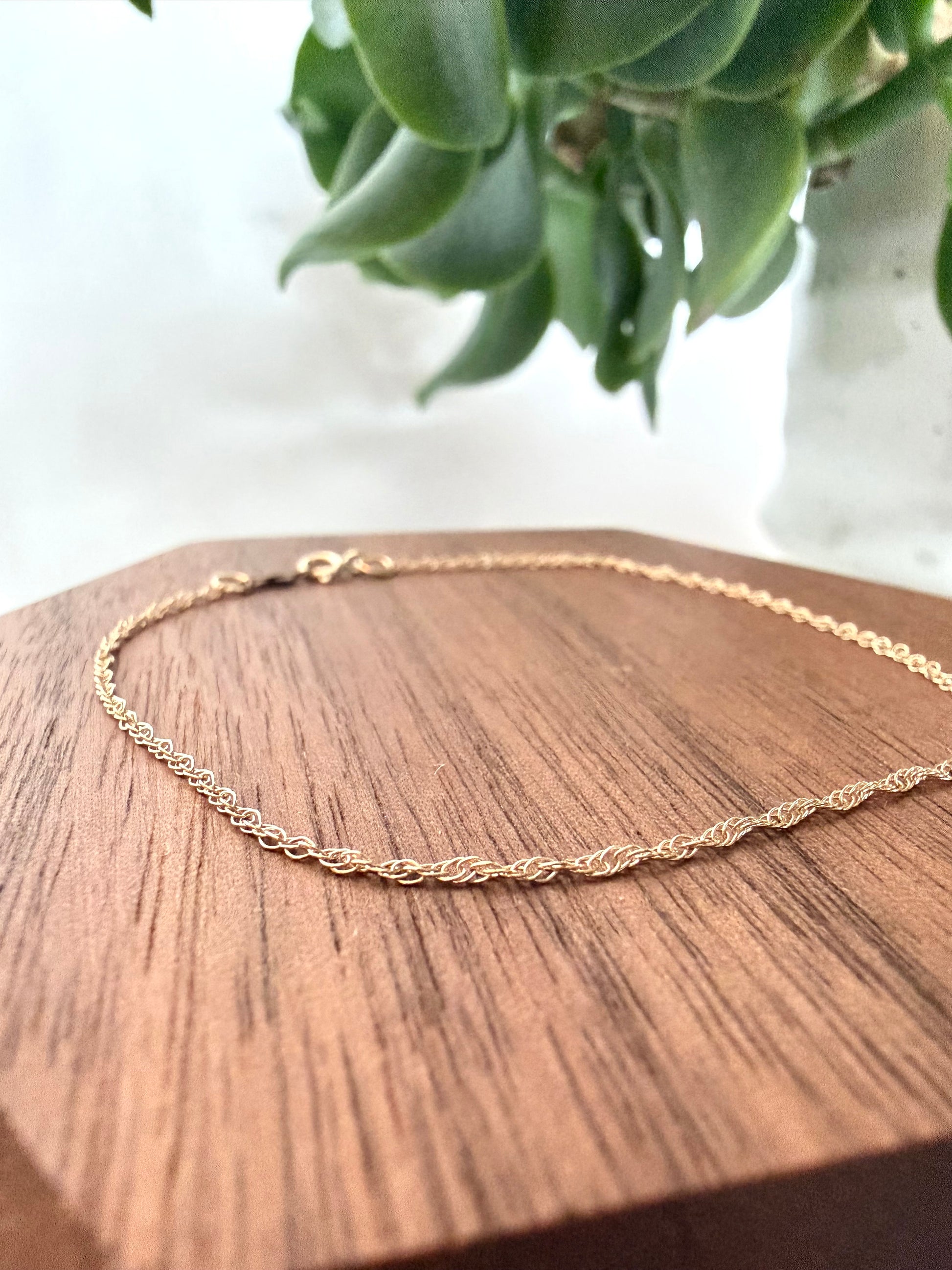Rope chain 14kt yellow gold bracelet, 1mm thick, 7 inches long, with spring ring clasp